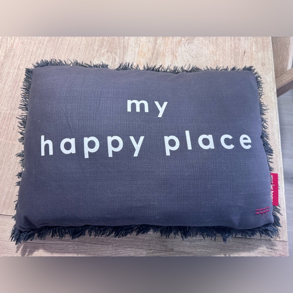 Peace Love World “My Happy Place” accent pillow.